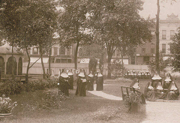 Sisters in front of their temporary quarters on 28th and Wabash