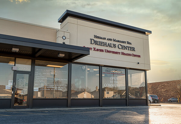 SXU Health Center image with a sliver of sunset in the background