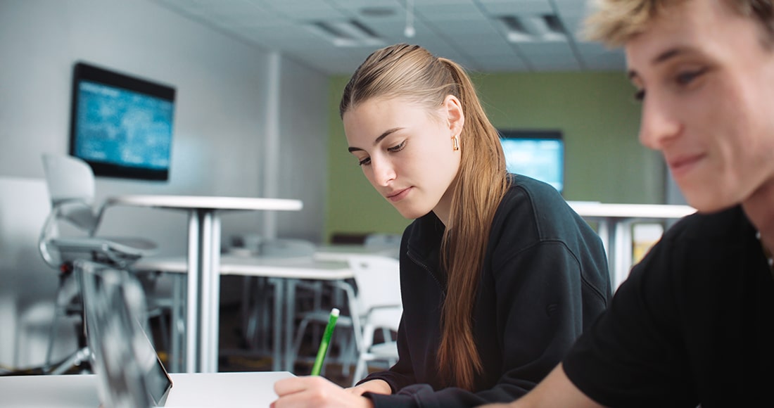 Girl with writing in class