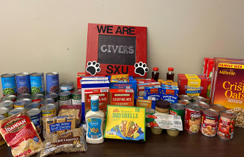 https://www.sxu.edu/_resources/images/news/2022/2022-fooddrive%20350x225.jpg