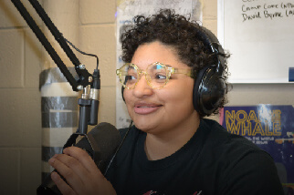 Girl at WXAV Radio Station