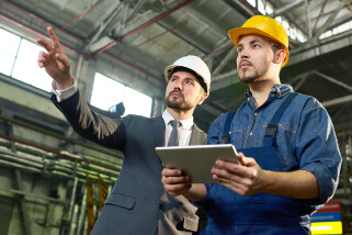 Workers discussing plans