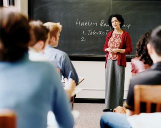 Teacher at front of classroom